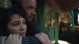 Aaron Paul hugging a woman in Smashed