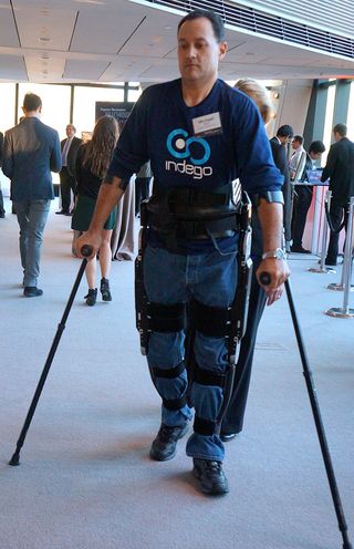 Michael Gore, a T10 complete paraplegic, uses the Indego Exoskeleton to walk.