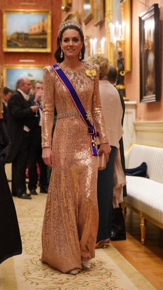 Kate Middleton wears a glittering Jenny Packham gown to a dinner at Buckingham Palace