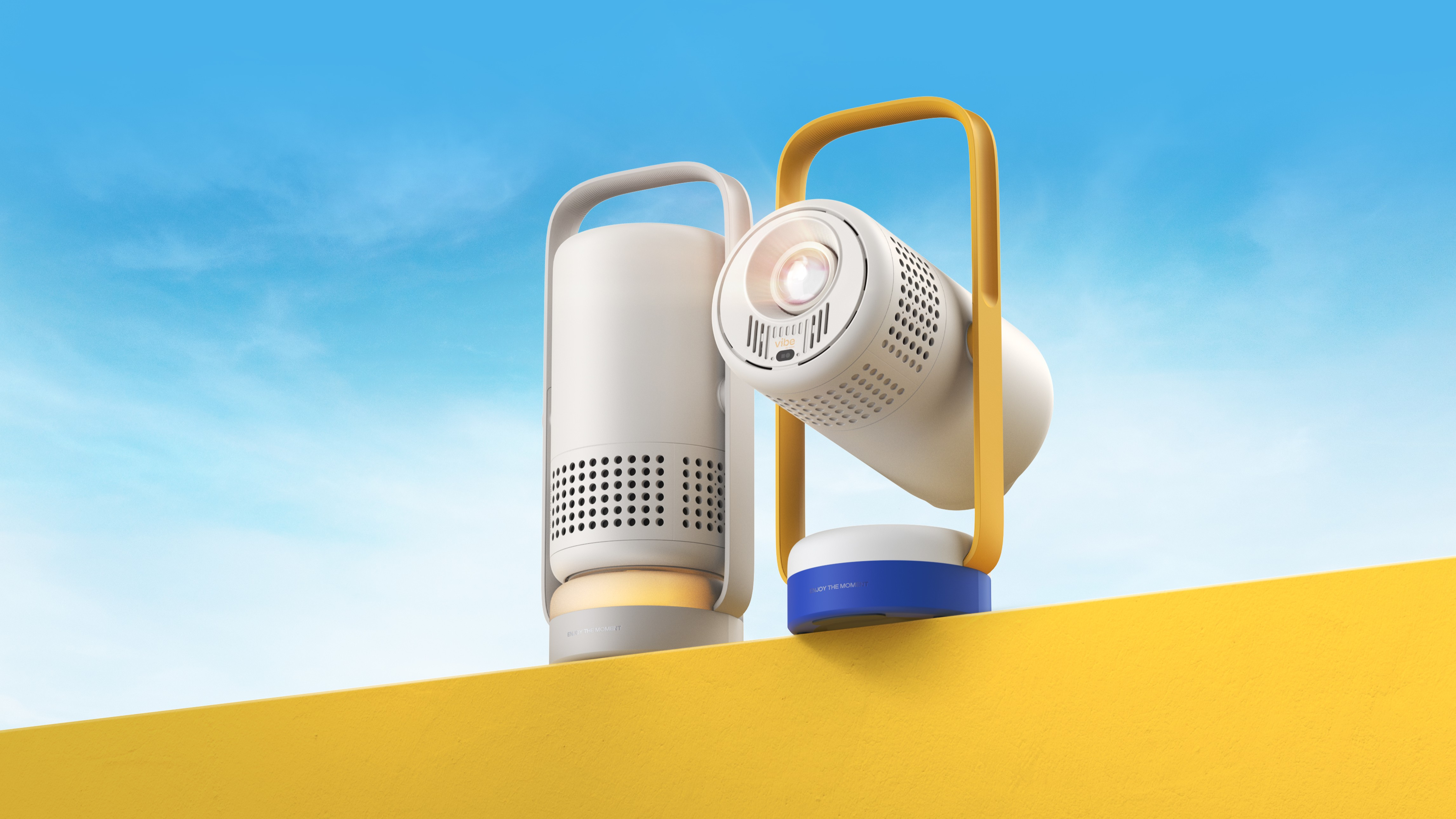 Vibe by Xgimi&#039;s Vibe One portable projector on a yellow surface with a blue background.