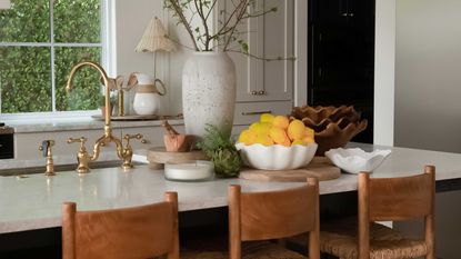 a kitchen countertop with an undermount sink