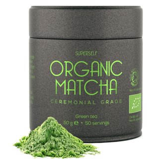 superself matcha green tea with a pile of the powder at the base