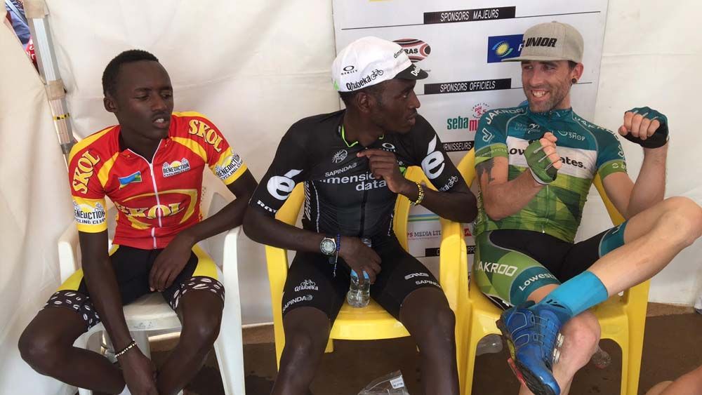 Stage 3 winner Timothy Rugg (right) with race leader Valens Ndayisenga (centre) and Samuel Mugisha (left)
