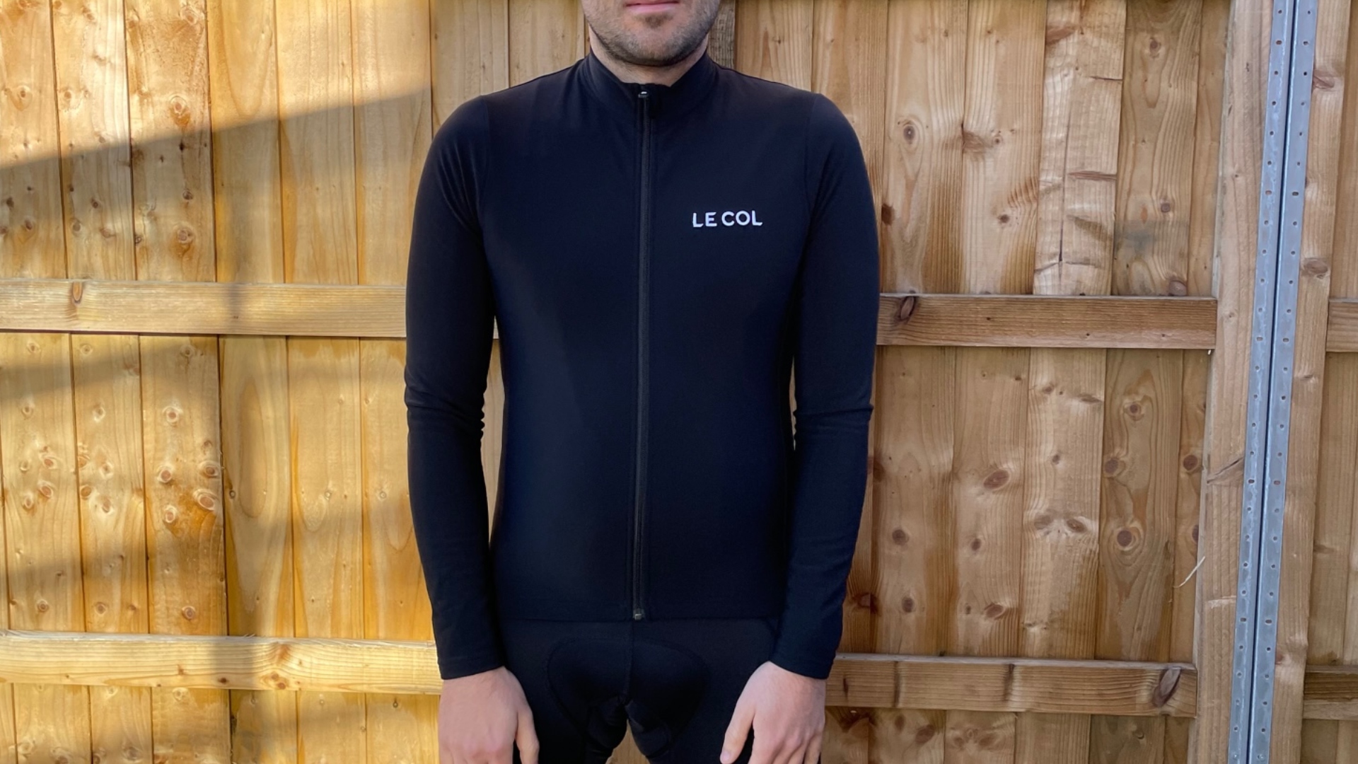 Male cyclist wearing Le Col Aqua Zero LS jersey