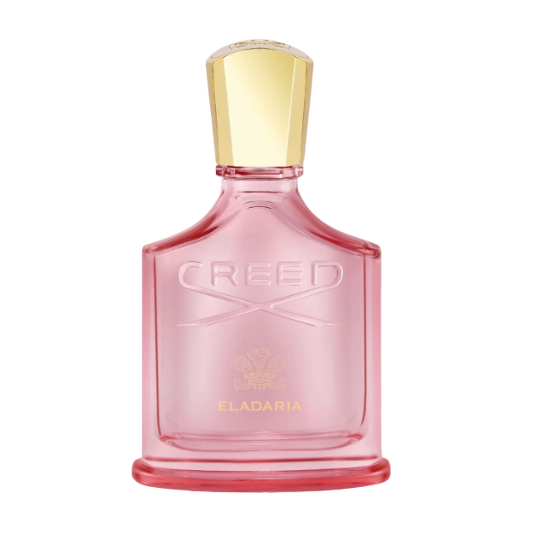 A product shot of the Creed Eladaria, which has a pink glass bottle, on a white background