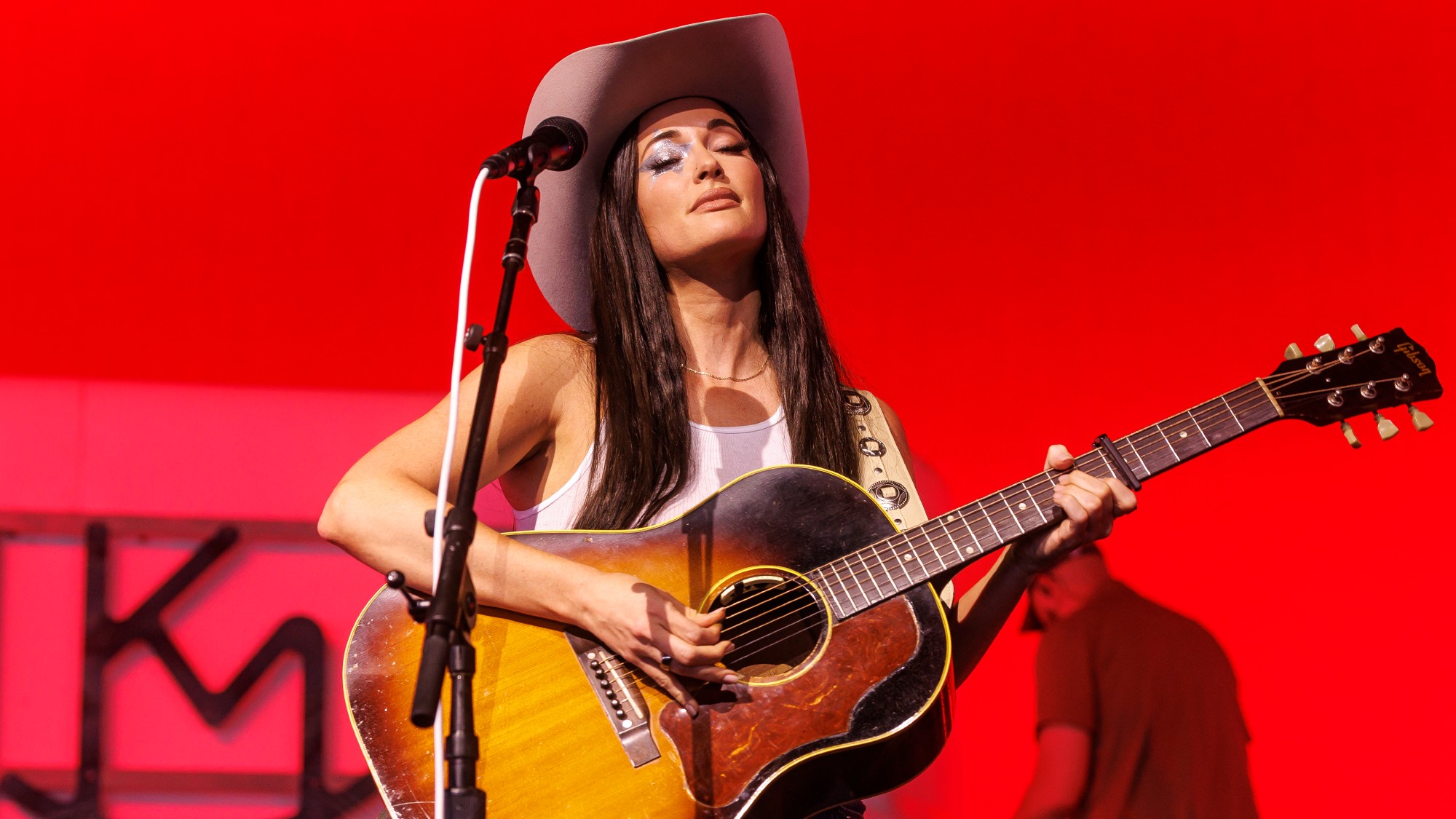 Kacey Musgraves plays the guitar at Coachella