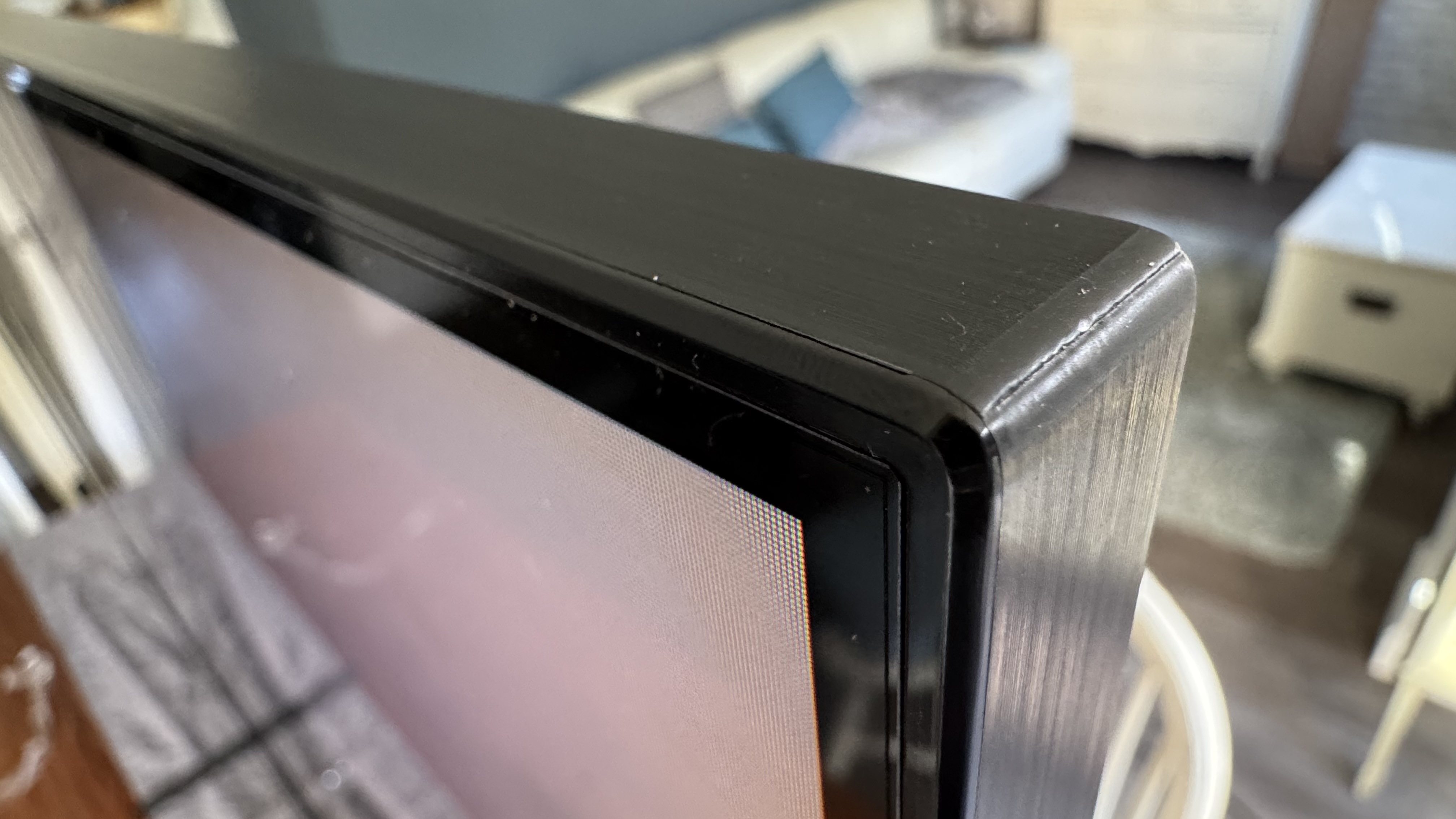 The corner of the Sony 65 Bravia 5 TV
