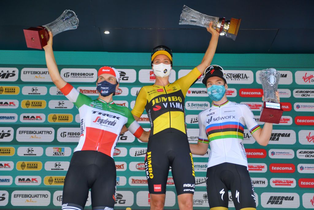 PUEGNAGO DEL GARDA ITALY JULY 08 Elisa Longo Borghini of Italy and Team Trek Segafredo 2nd place Marianne Vos of Netherlands and Jumbo Visma Team stage winner Anna Van Der Breggen of Netherlands and Team SD Worx celebrates at podium during the 32nd Giro dItalia Internazionale Femminile 2021 Stage 7 a 1096km stage from Soprazocco di Gavardo to Puegnago Del Garda 219m GiroDonne UCIWWT on July 08 2021 in Puegnago del Garda Italy Photo by Luc ClaessenGetty Images