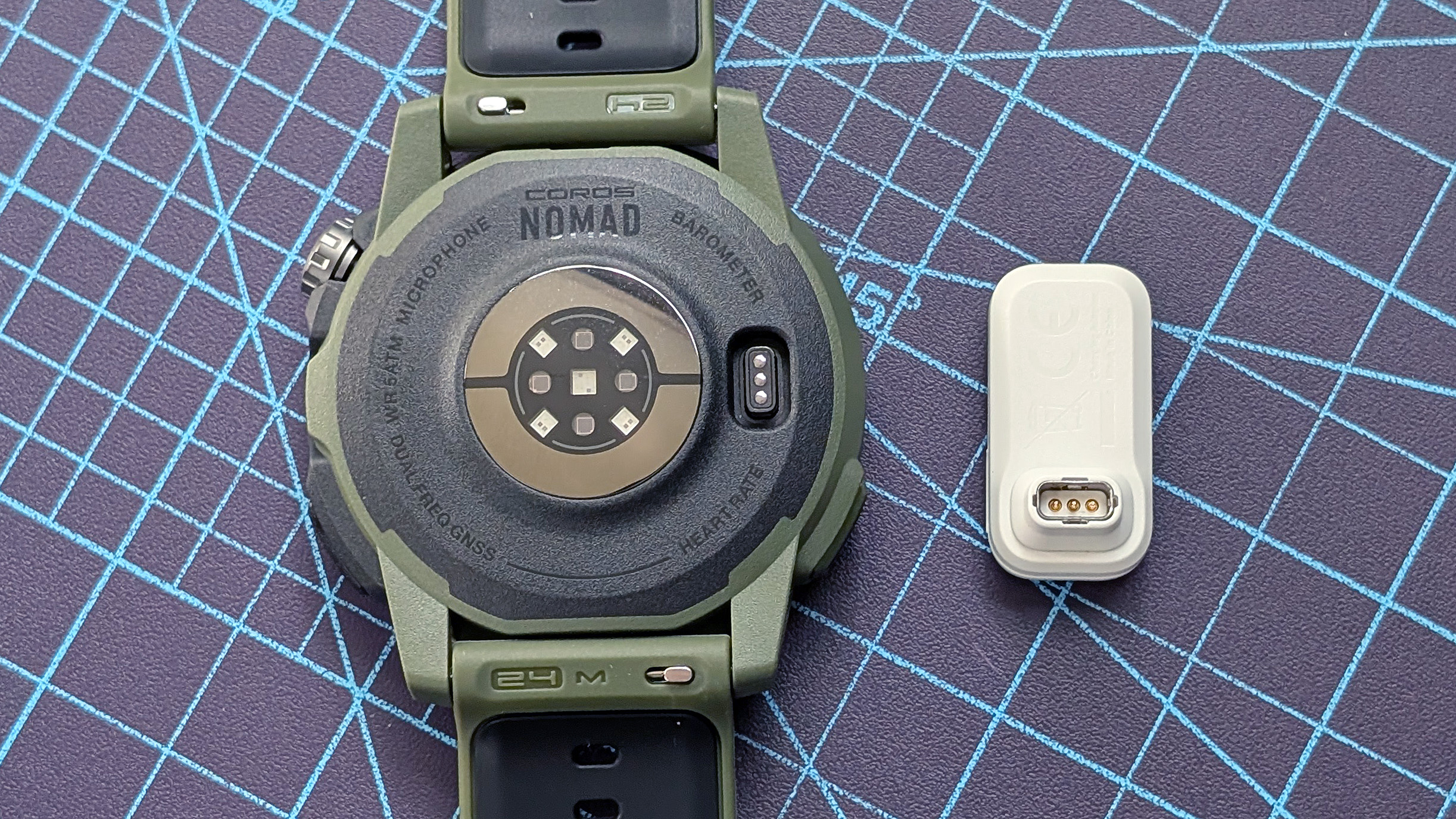 Close-up of the Coros Nomad rugged smartwatch in dark green