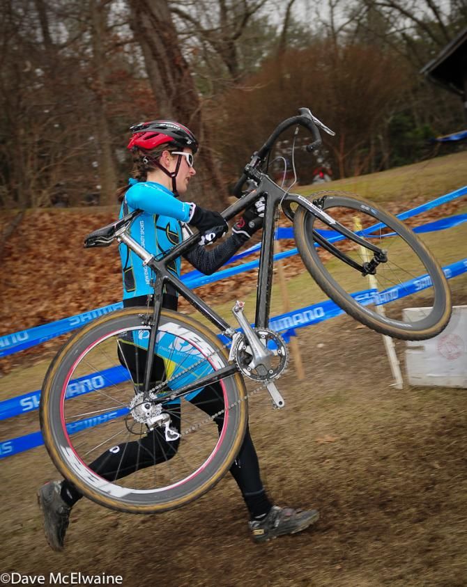 Kate Northcott (NESS Team New England) running the barriers with two laps to go