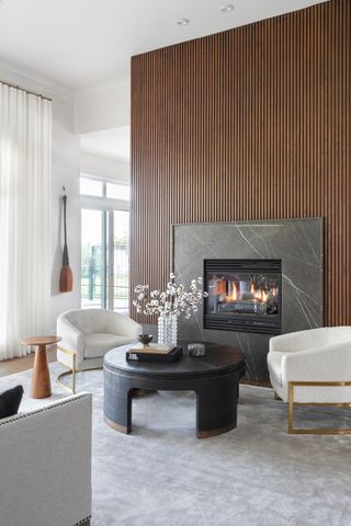 A fireplace with wall panelling
