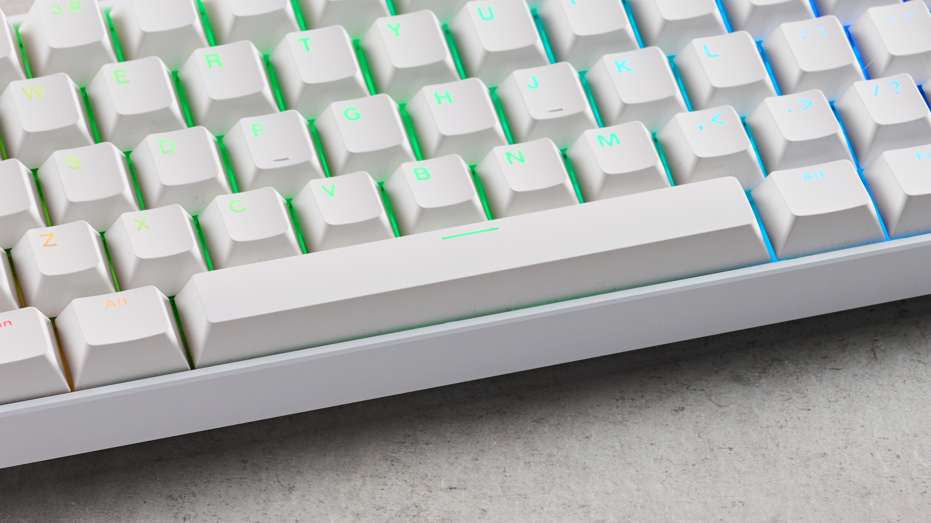 Close-up of space bar on MonsGeek FUN60 Ultra, on desk
