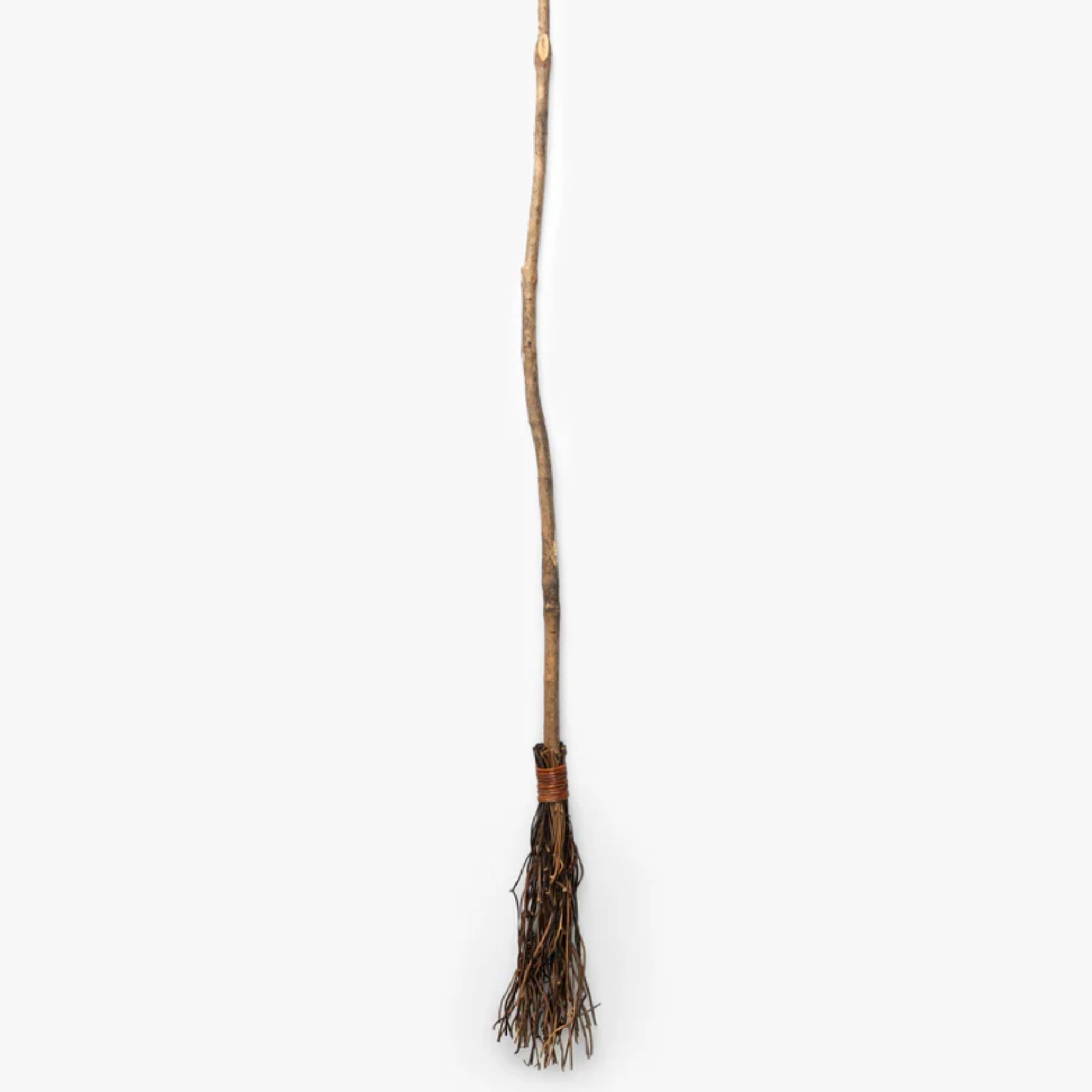 Halloween witch&#039;s broomstick made of wood and twigs
