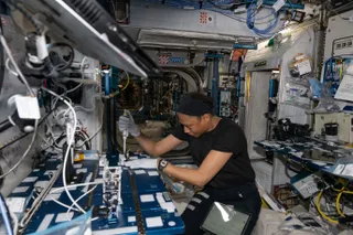 NASA astronaut Jeanette Epps extracts DNA for the Genomic Enumeration of Antibiotic Resistance in Space experiment on board the International Space Station