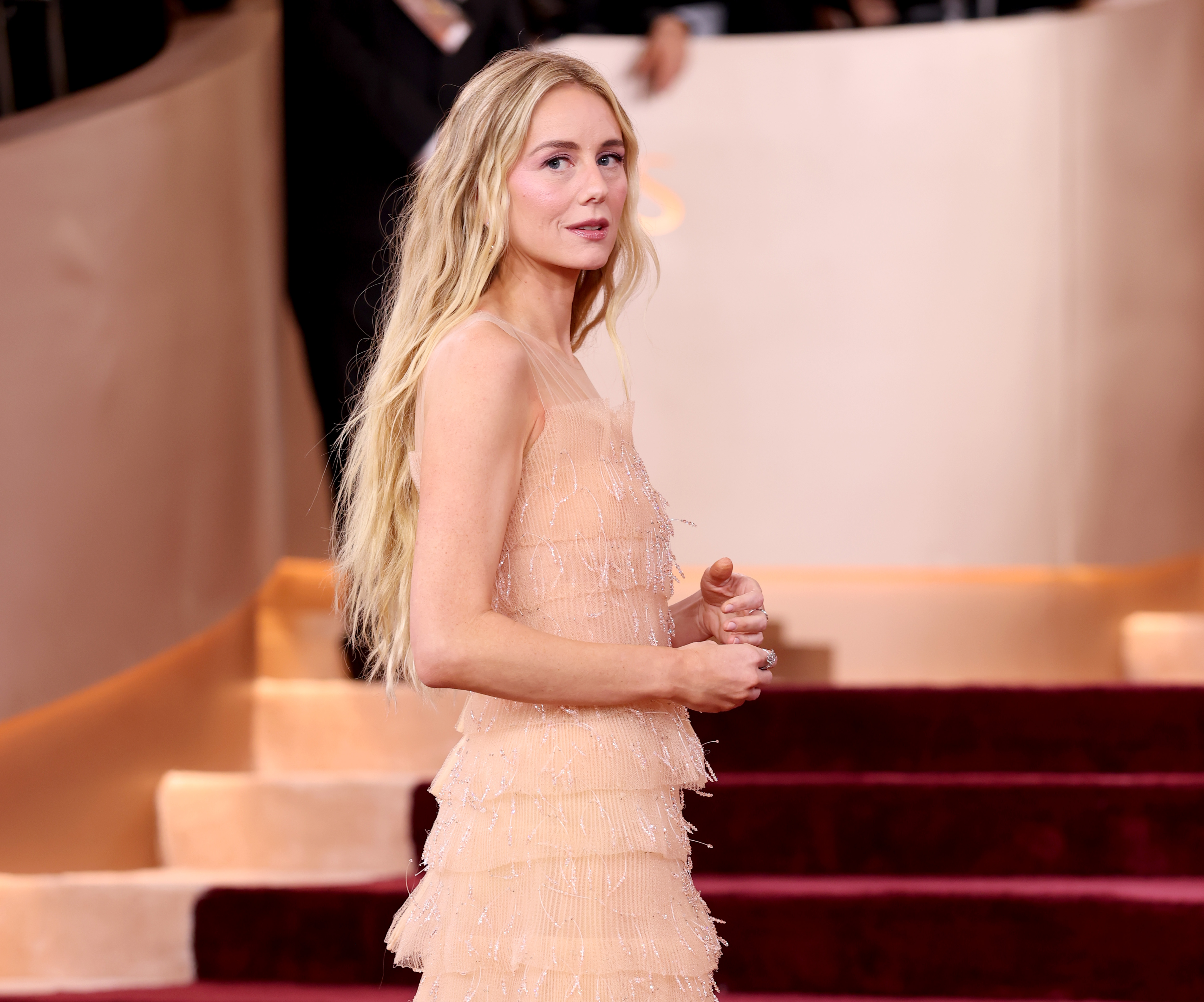 Photo of Justine Lupe at the 2026 Golden Globes with a soft bend hairstyle