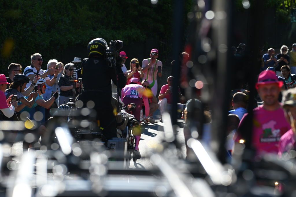 PERUGIA ITALY MAY 10 Tadej Pogacar of Slovenia and UAE Team Emirates Pink Leader Jersey sprints while fans cheers during the 107th Giro dItalia 2024 Stage 7 a 406km individual time trial stage from Foligno to Perugia 472m UCIWT on May 10 2024 in Perugia Italy Photo by Dario BelingheriGetty Images