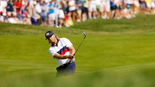 Sam Burns hits a bunker shot during the 2023 Ryder Cup