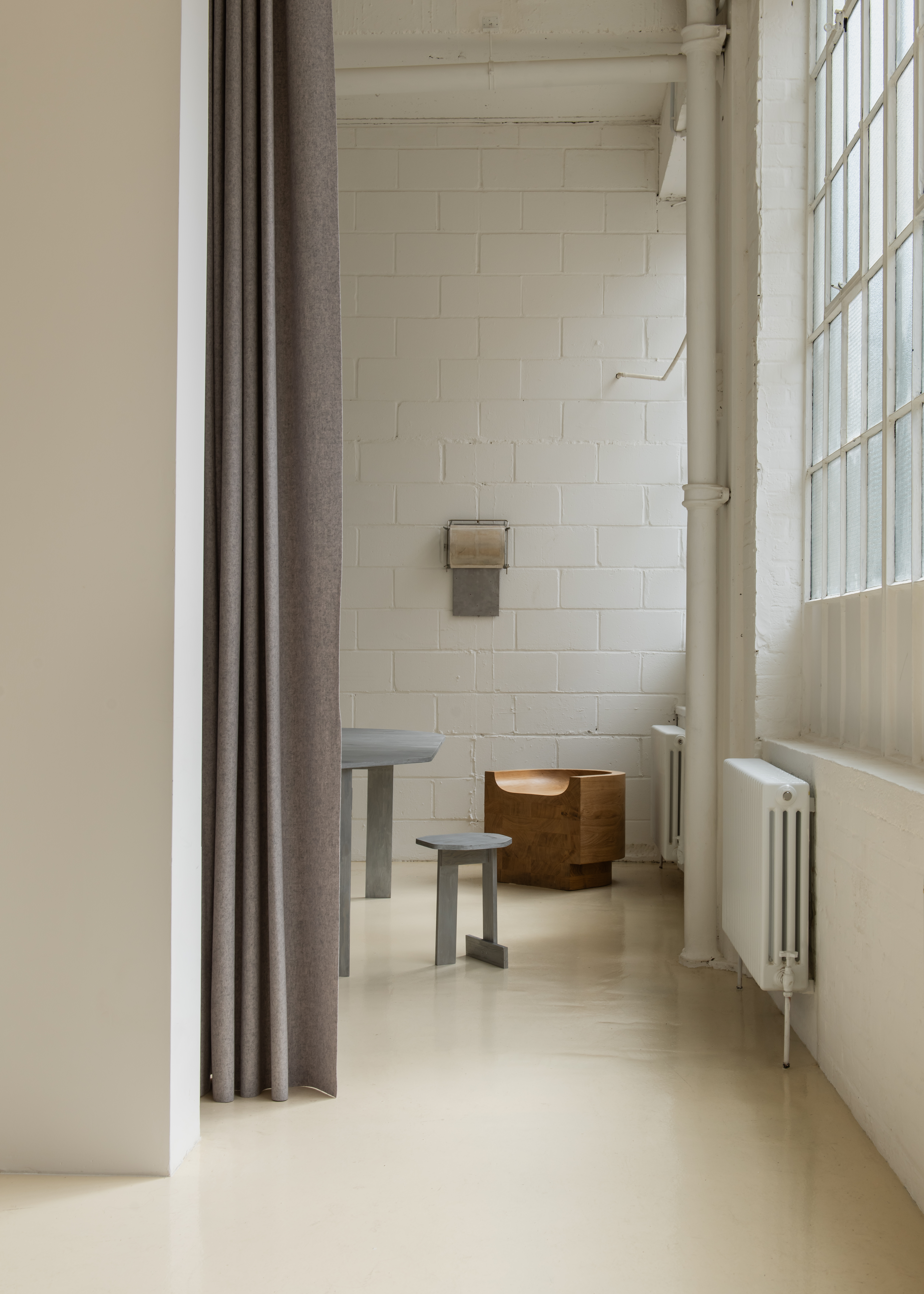 All Projects, a new minimalist new gallery by EBBA, in an old east london warehouse - brick outside and clean, textured surfaces inside