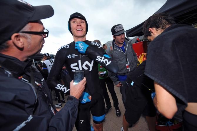 Chris Froome (Sky) bundled up after the finish of stage 16