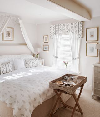 White-bedroom,-canopy,-wicker-tray-table,-breakfast