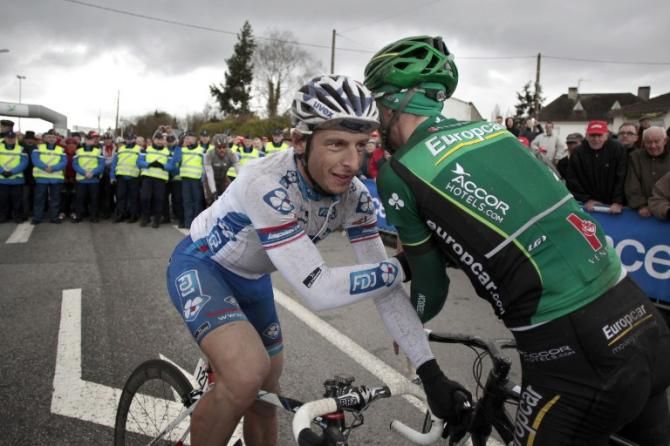 Paris-Camembert winner Pierrick F&eacute;drigo (FDJ) is congratulated by third-place finisher Pierre Rolland (Europcar)