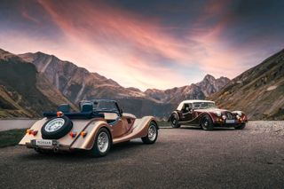 Morgan Plus Four and Plus Six with mountain sunset backdrop