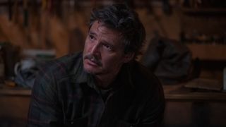 Joel (Pedro Pascal) looks up at Tommy in The Last Of Us episode 6.
