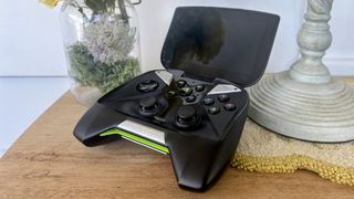 Nvidia Shield Portable open on a side table with the display powered off