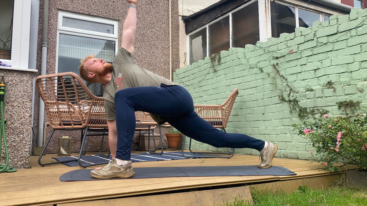 Fit&amp;Well fitness writer Harry Bullmore doing the world&#039;s greatest stretch