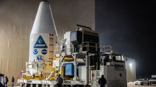 The United Launch Alliance Atlas V payload fairing containing the National Oceanic and Atmospheric Administration’s Joint Polar Satellite System-2 satellite arrives at the vertical integration facility at Space Launch Complex-3 at Vandenberg Space Force Base in California on Oct. 18, 2022. 