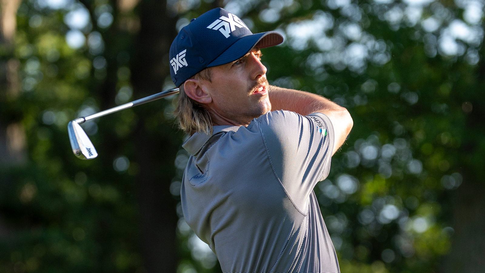 Jake Knapp hits an iron shot