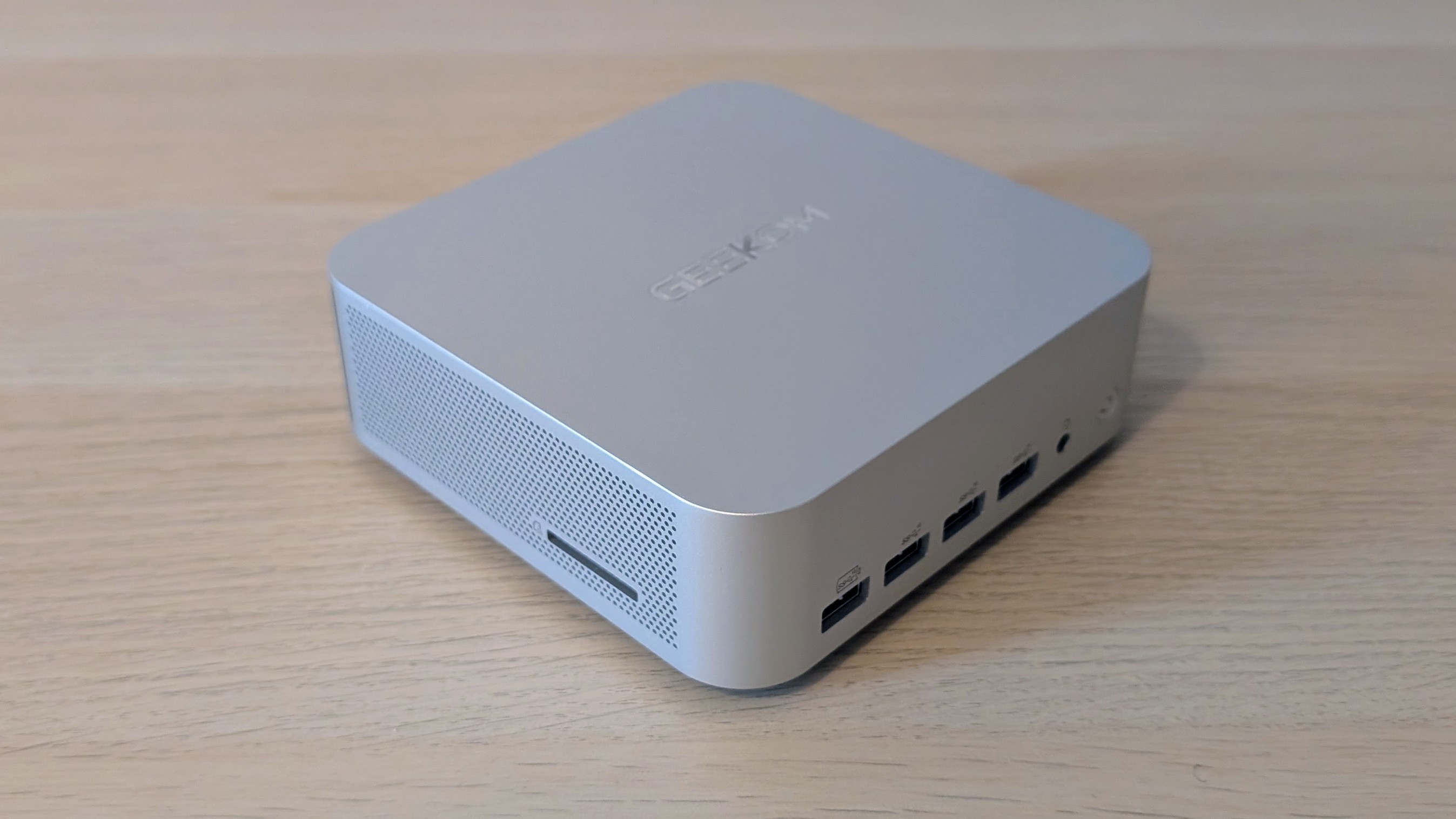 The Geekom A9 Max PC on a desk