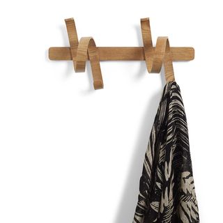 wooden wall hanger with black clothe