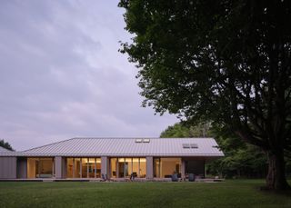 First house in summer green seen from the outside