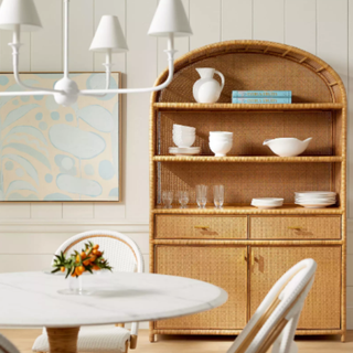 A wooden hutch in a dining room
