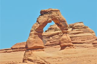 An arch is created when a sandstone fin is eroded, creating a hole