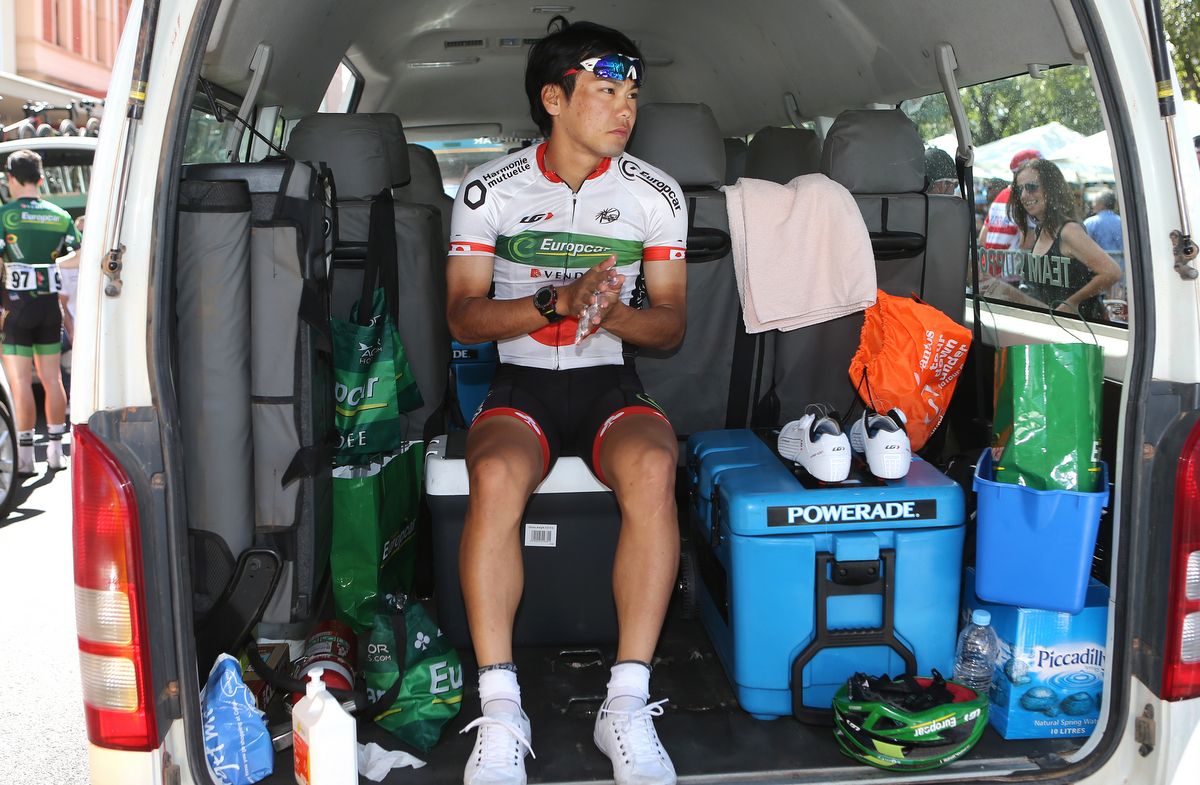 With no team buses, riders get ready for the stages in team vans