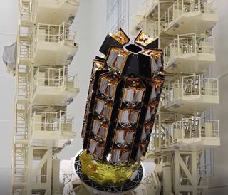 OneWeb's 36 internet satellites are seen stacked in launch position ahead of a Dec. 18, 2020 launch from Russia's Vostochny Cosmodrome.