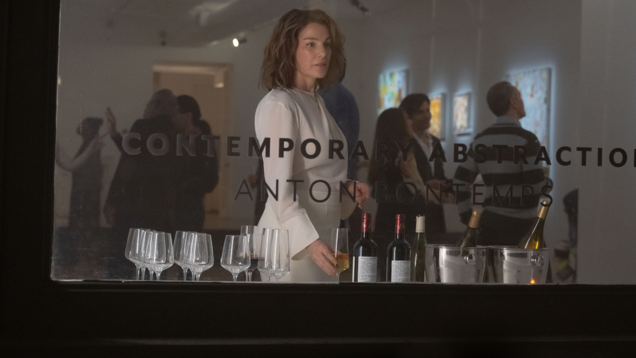 Vanessa Fisk (Zurer) stares outside of the art gallery on Daredevil: Born Again.