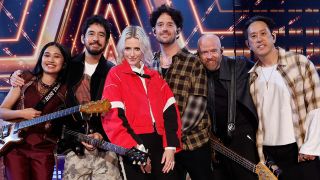 Linkin Park posing with 2026 America's Got Talent winner Nene Royal