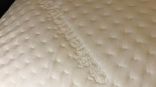 Close up of the Authenticity50 Custom Comfort Pillow's cover