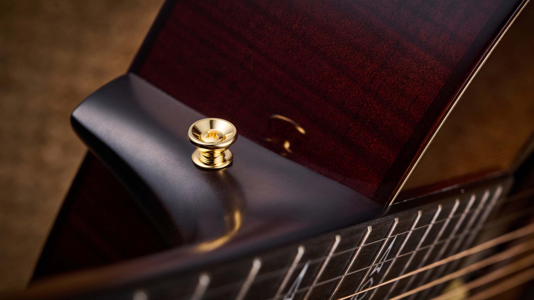 Martin GPE Inception Maple photographed against a wheat coloured woven rug.