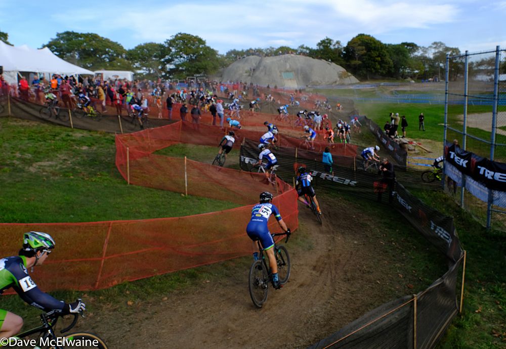 Racers zig-zag on a small hillside