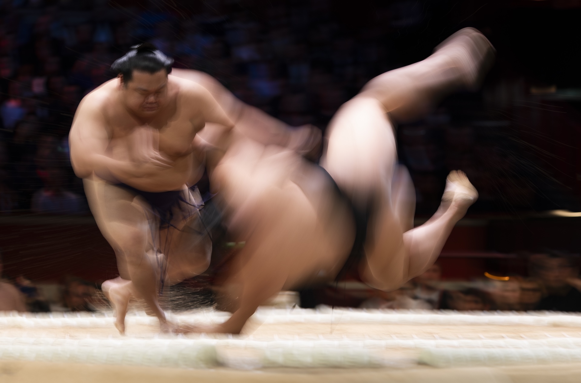 LONDON, ENGLAND - OCTOBER 15: Churanoumi flips Shodai during day one of The Grand Sumo Tournament at Royal Albert Hall on October 15, 2025 in London, England. This is the first time since the 1991 event at the Royal Albert Hall that an official Five Day Basho tournament will take place outside of Japan. The tournament will host the most accomplished and elite sumos, including those who have reached the top rank of Yokozuna, and showcase Japan&#039;s rich cultural history and traditions. (Photo by Ryan Pierse/Getty Images)