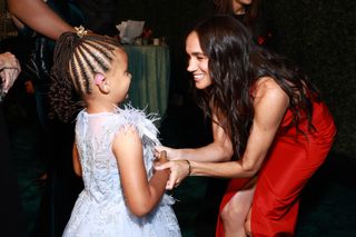 Ella Nelson and Meghan, Duchess of Sussex attend the Children's Hospital Los Angeles Gala 2024 at JW Marriott LA Live on October 05, 2024 in Los Angeles, California.