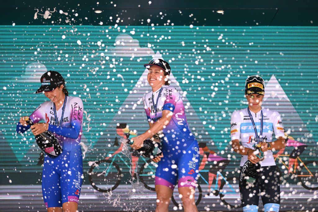 CAGLIARI ITALY JUNE 30 LR Georgia Baker of Australia and Team BikeExchange Jayco on second place stage winner Kristen Faulkner of United States and Team BikeExchange Jayco and Elisa Balsamo of Italy and Team Trek Segafredo on third place pose and celebrate on the podium ceremony after the 33rd Giro dItalia Donne 2022 Stage 1 a 47km individual time trial stage from Cagliari to Cagliari ITT GiroDonne UCIWWT on June 30 2022 in Cagliari Italy Photo by Dario BelingheriGetty Images