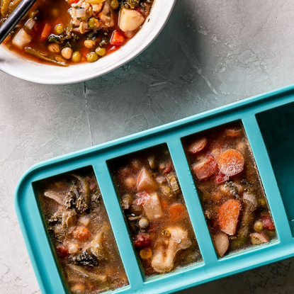 Close-up of souper cube filled with chilli.