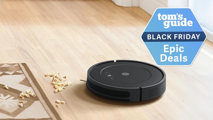 iRobot Roomba Robot Vacuum and Mop Combo vacuming up popcorn
