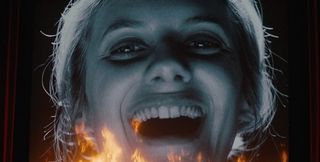 Inglorious Basterds Melanie Laurent laughing on a burning movie screen