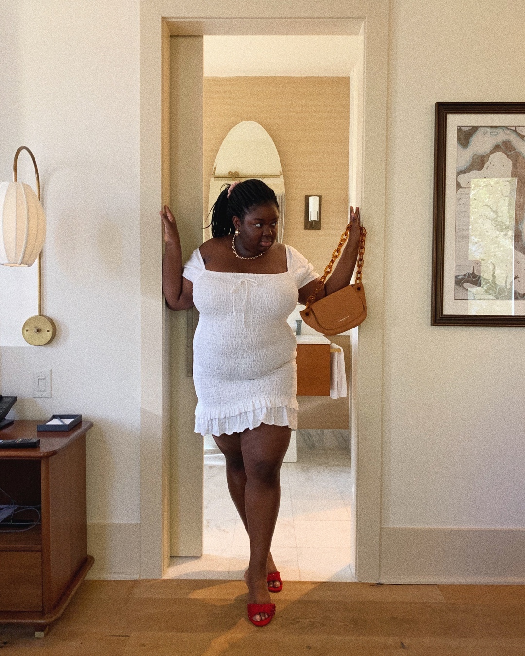An image of @abimarvel wearing one of the key summer dress trends for 2025.